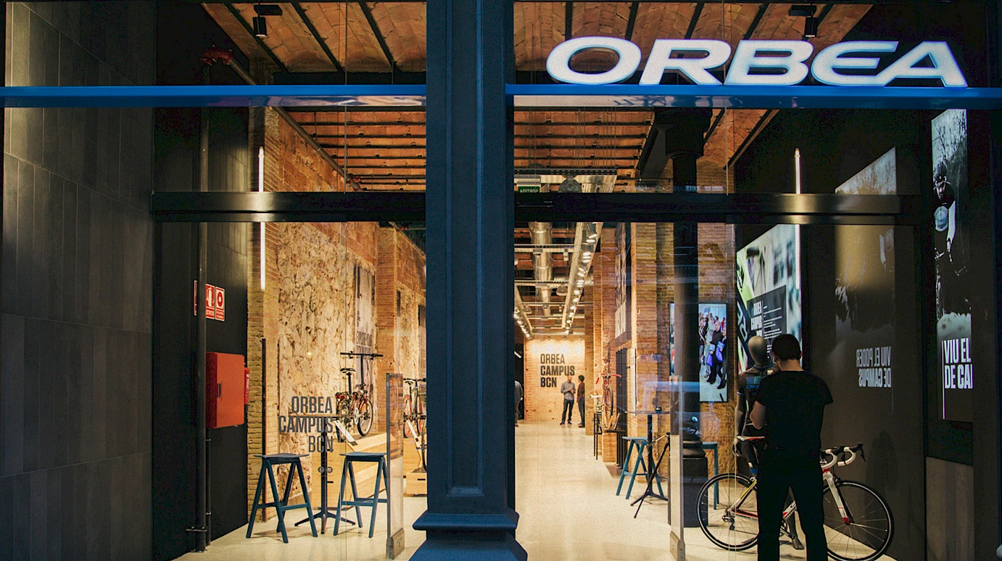orbea interiorismo 01 spaces shop branding move narrative lifestyle design sports 